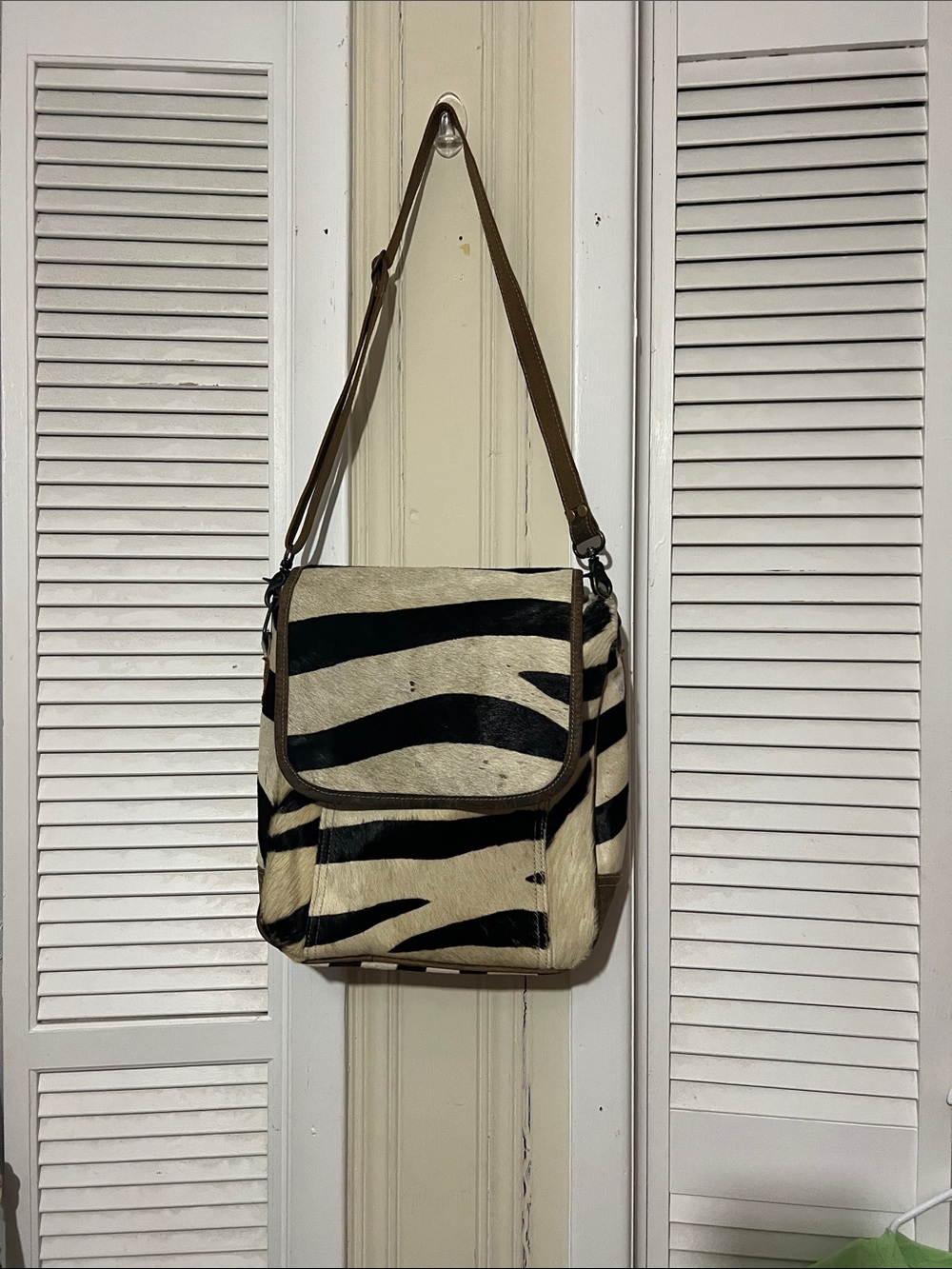 Zebra-Print Messenger Bag in Black and Cream